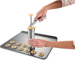 Presă de patiserie din oțel inoxidabil Tescoma DELÍCIA | Versatilitate maximă pentru decorarea fursecurilor și torturilor | 20 de discuri decorative și 4 duze de decorare | Durabilitate și calitate |