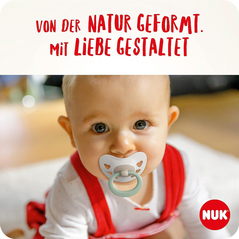 Suzete NUK Signature Day & Night pentru bebeluși | 0-6 luni | Calmează 95% dintre bebeluși | Suzete din silicon în formă de inimă, fără BPA | Strălucesc în întuneric | Stele | Pachet de 4
