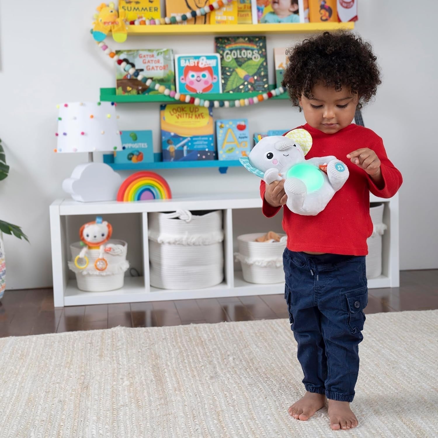 Bright Starts, Hug-a-bye baby elefant de jucărie cu lumini, melodii, texturi diferite și multe altele, multicolor Jucarii Bebe Naty Shop