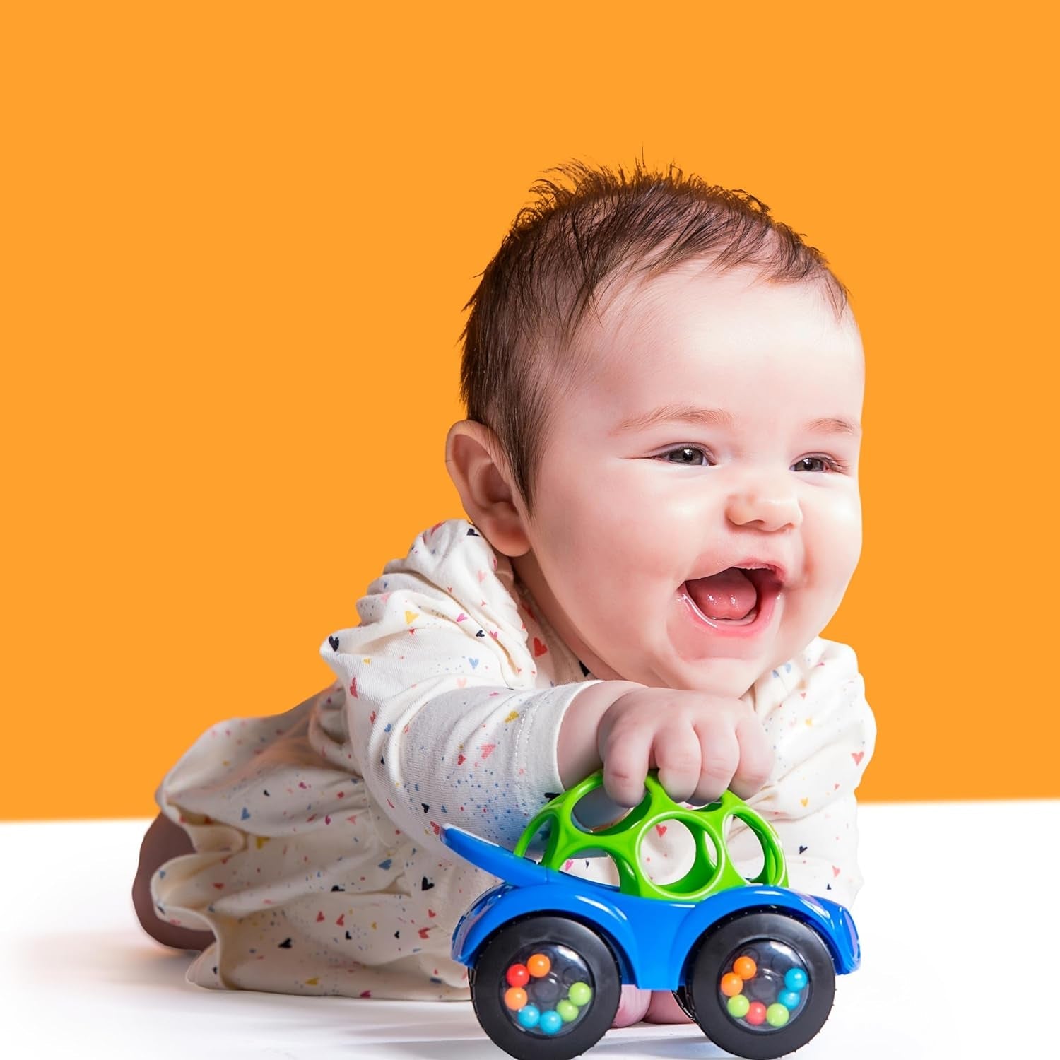 Bright Starts, Oball, mașină de jucărie cu zornăitor, verde-albastru Jucarii Bebe Naty Shop