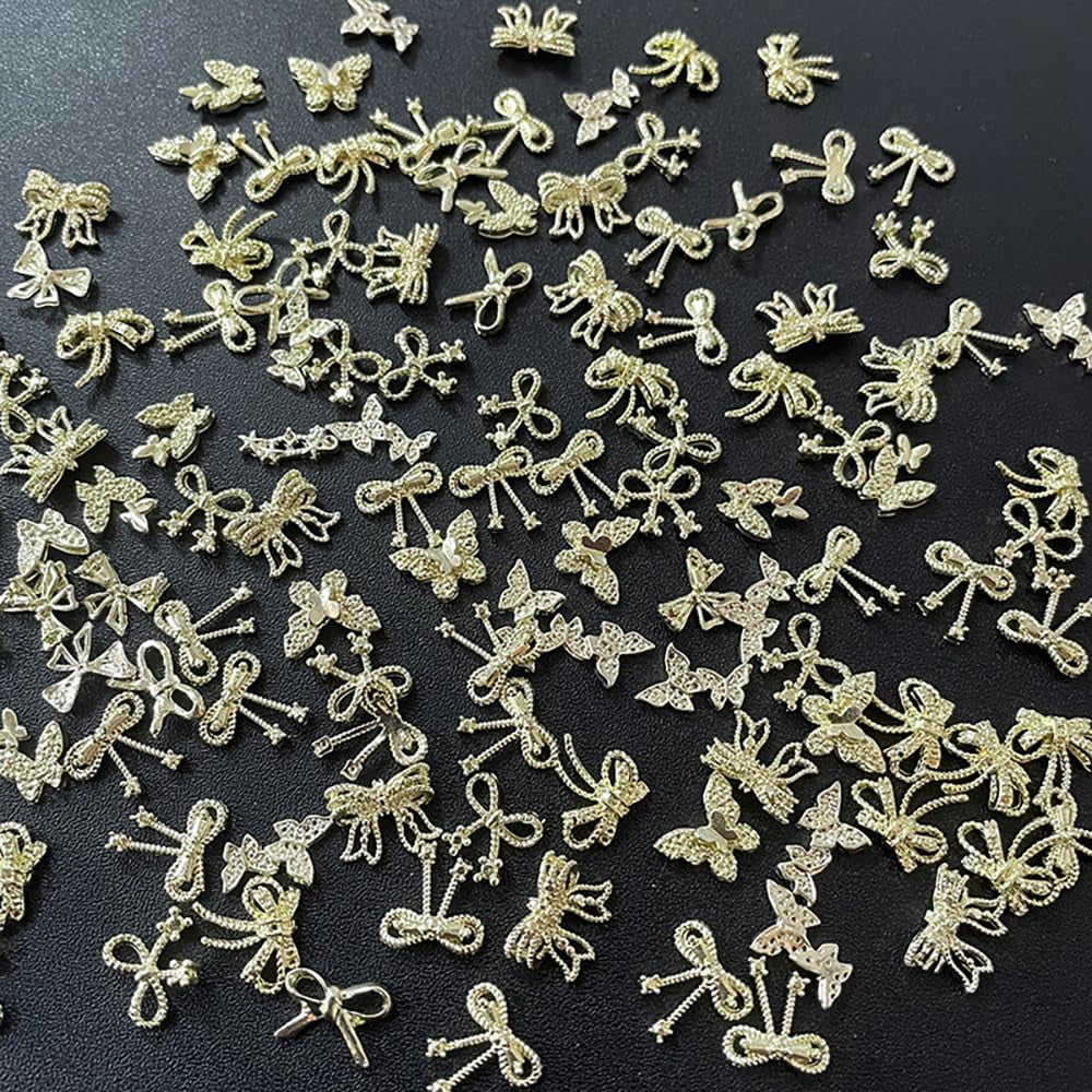50Stück 3D Gold Bow Nail Charms Butterfly Nail Art Charms Legierung Bogen Nagel Charms Nägel Zubehör Schleife Nagelschmuck Metall Schleifen Schmetterling Nageldesign Nagelanhänger Nailart Strasssteine