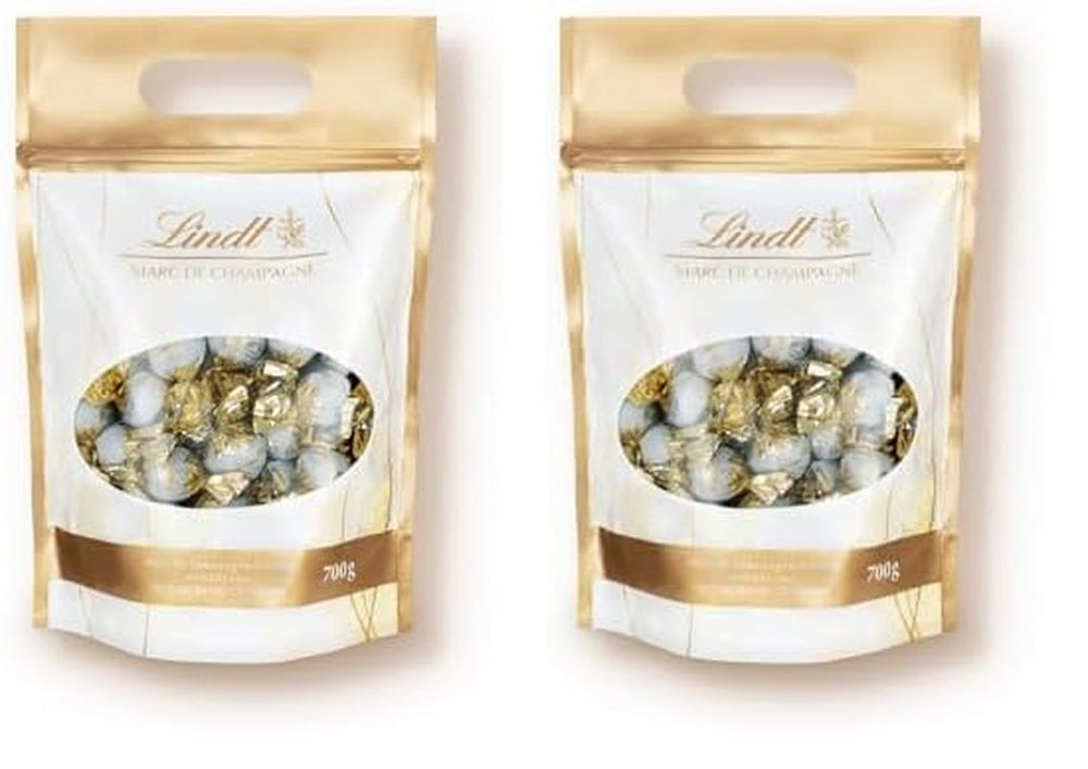 Bile de ciocolată Lindt Marc de Champagne | 700 g | Aprox. 56 de bomboane de ciocolată cu lapte cu umplutură rafinată, conține alcool | Pachet vrac | Cadou de ciocolată | Cadou de ciocolată