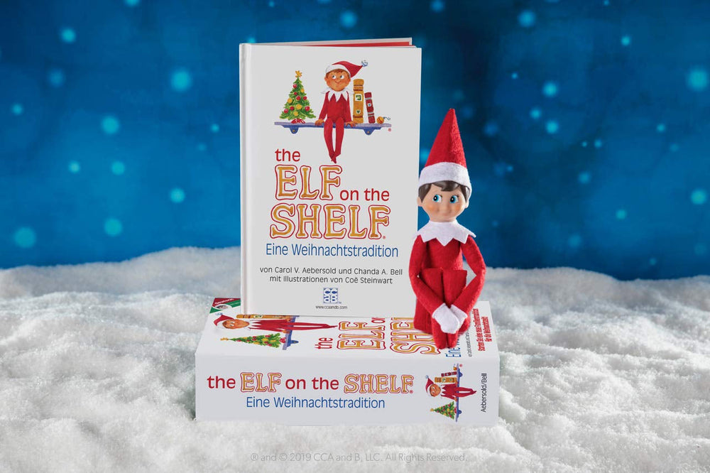 The Elf on the Shelf® Eine Weihnachtstradition | Junge mit Blauen Augen | inkl. zauberhaft illustriertem Buch, Erinnerungsbox & offizieller Adoptionsurkunde