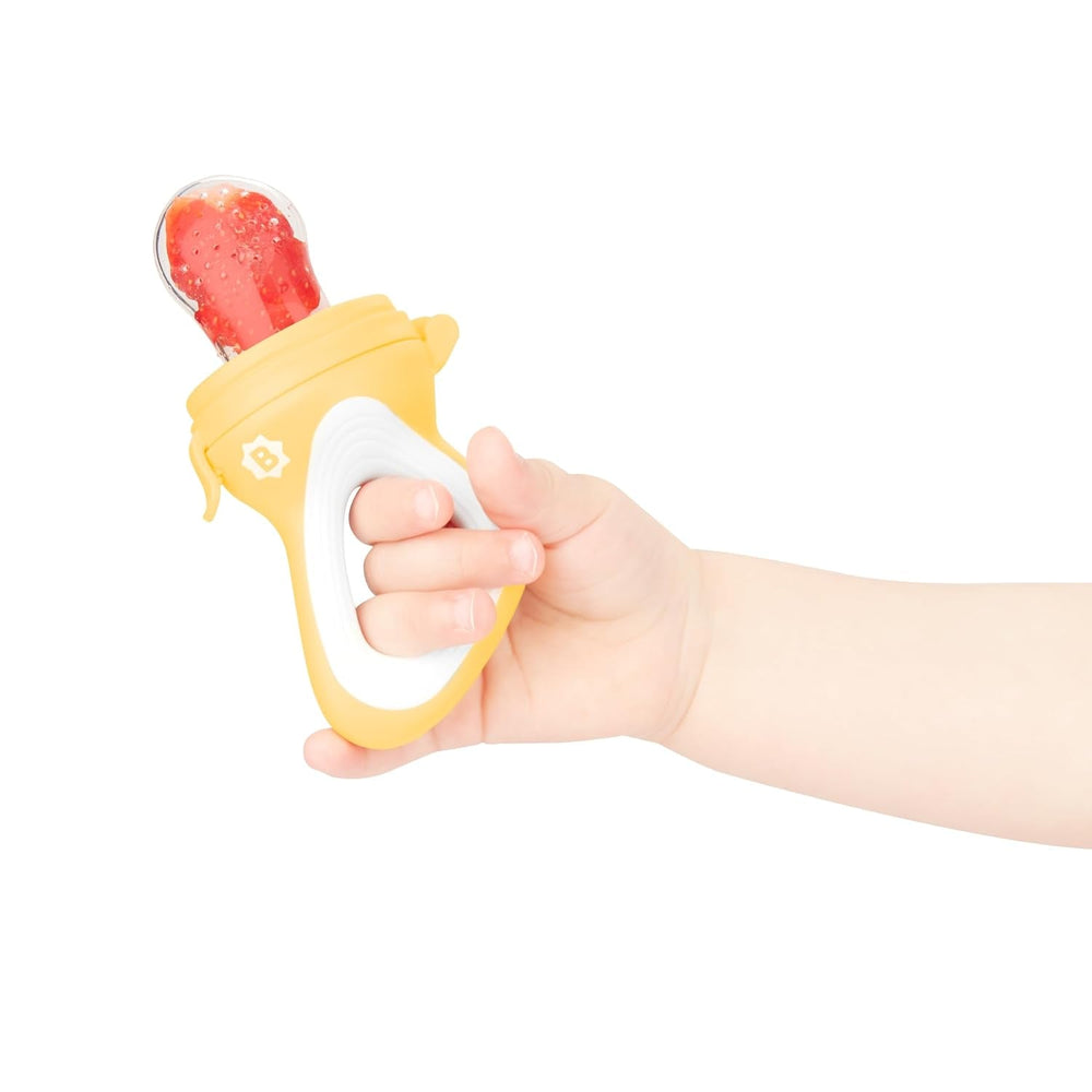 Hrănitoare pentru bebeluși Badabulle cu capac protector, mâner ergonomic, calmează gingiile și introduce arome noi, de la 4 luni, fără BPA