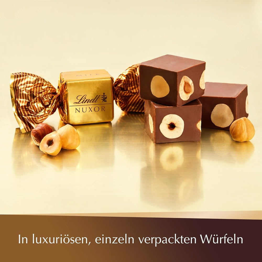 Ciocolată Lindt | Pliculeț de ciocolată cu lapte NUXOR | 103g | Cuburi cremoase de ciocolată cu lapte Gianduja cu alune de pădure prăjite | Cadou de ciocolată